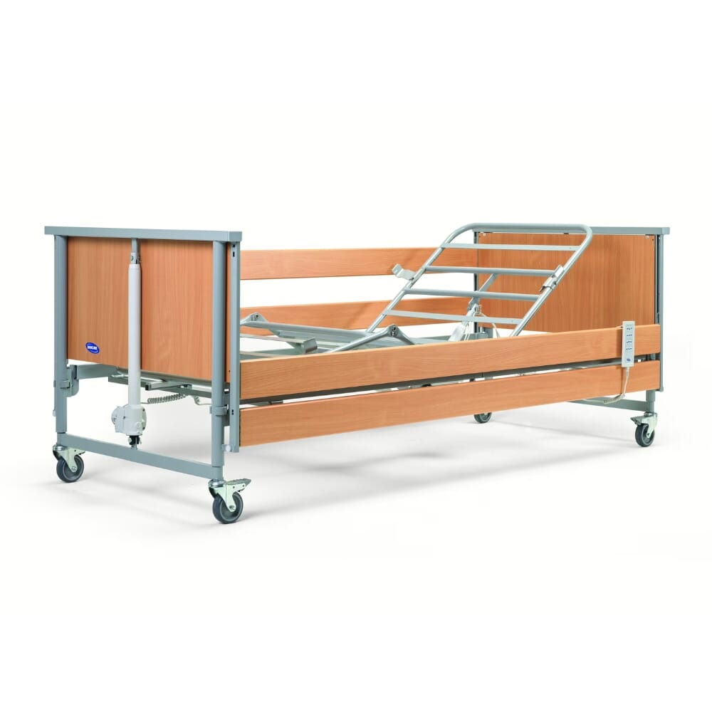 Invacare Accent profiling care bed with wooden head and foot panels
